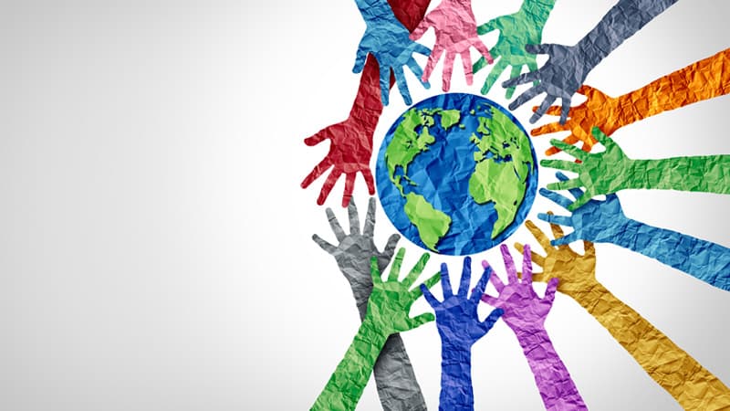 Illustration of hands reaching the globe