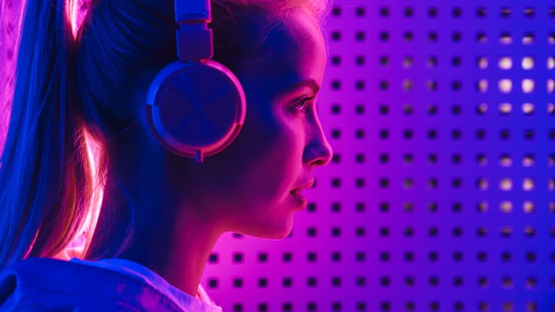 Person with headphones looking to the right