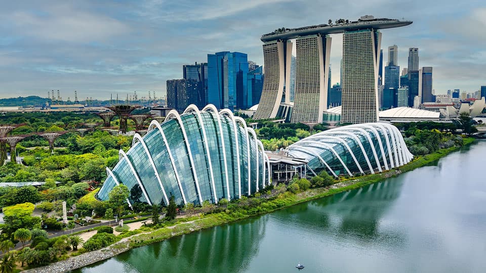 Aerial view of the parks, gardens and modern buildings at the Marina Bay area of the city of Singapore.