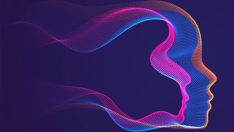 Colorful datapoints forming the shape of a human face