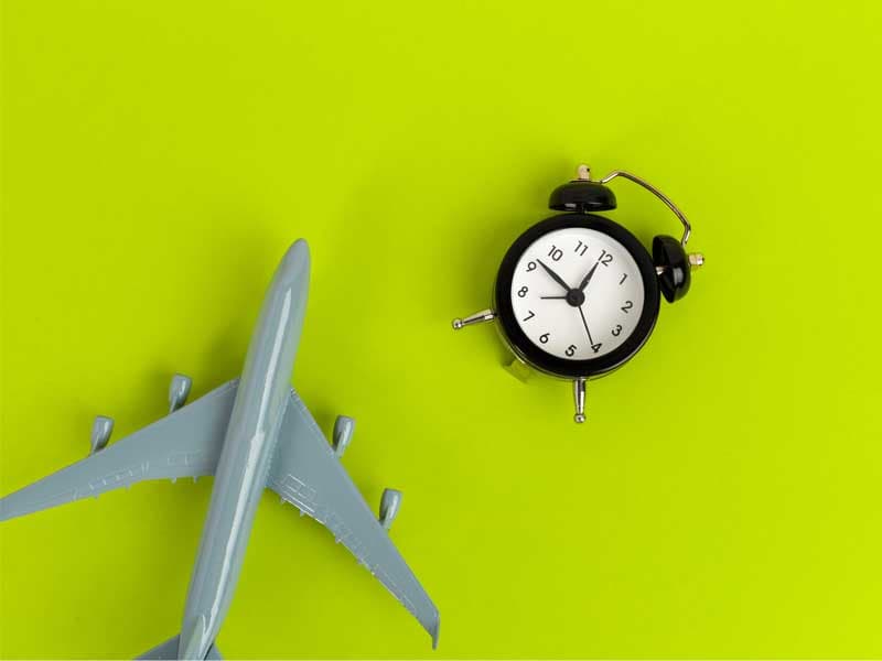 model plane beside a clock