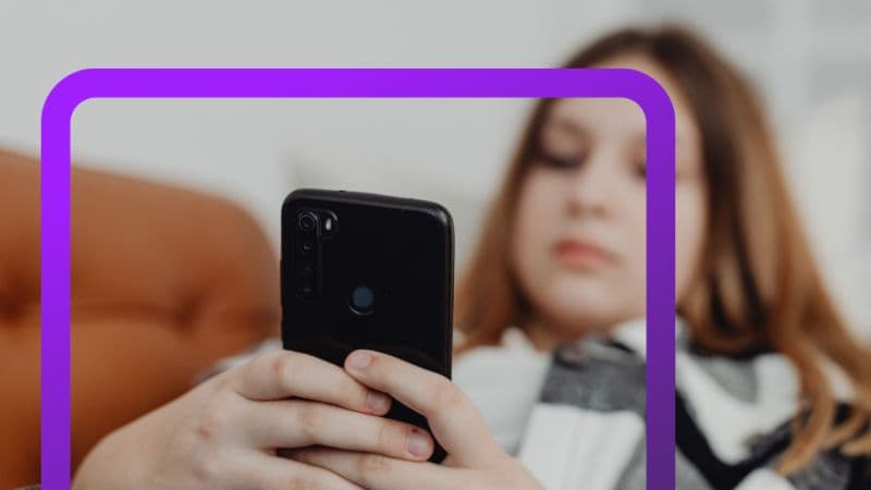 Woman looking at mobile phone.