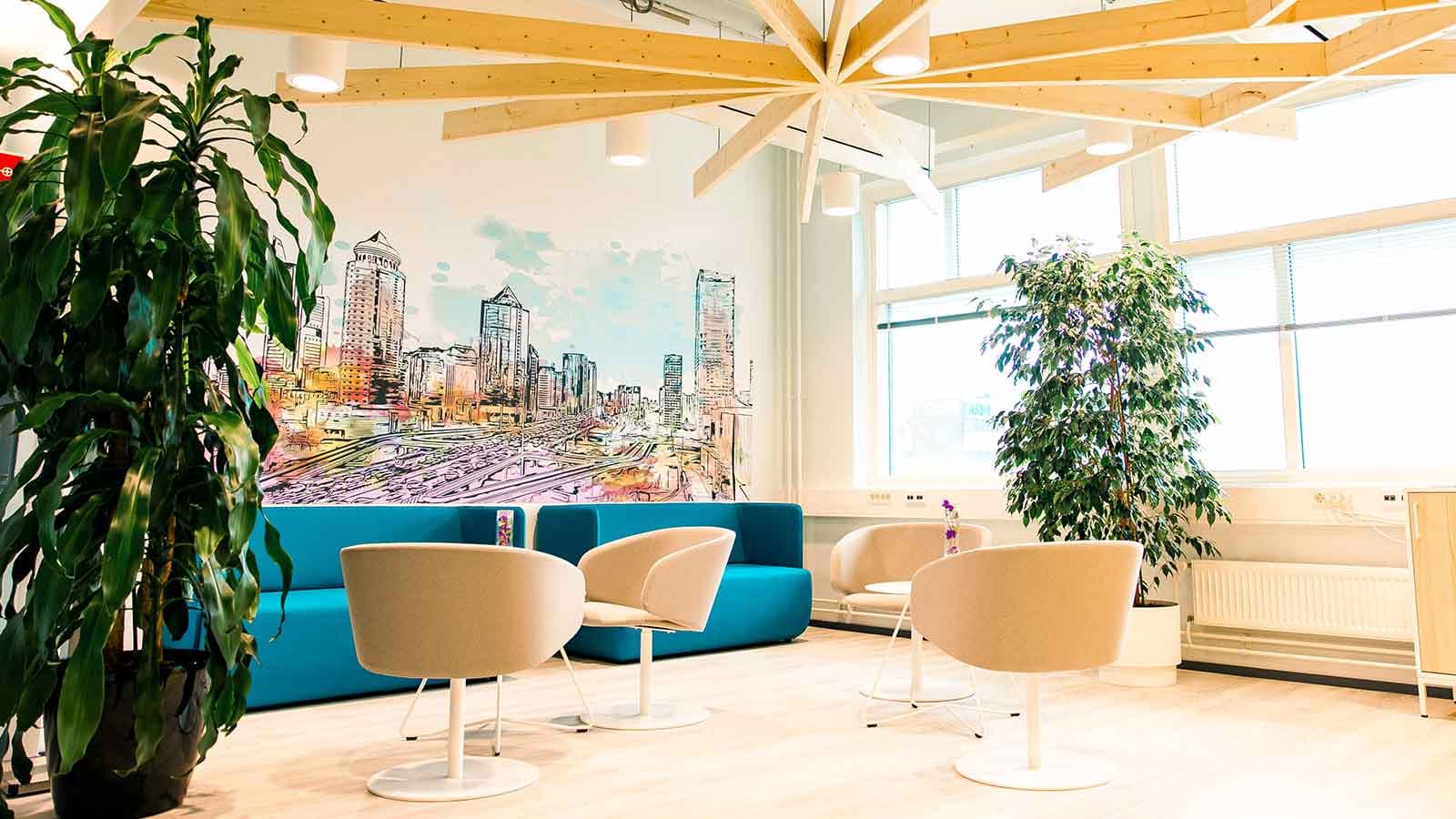 Sitting area with tables and couches.